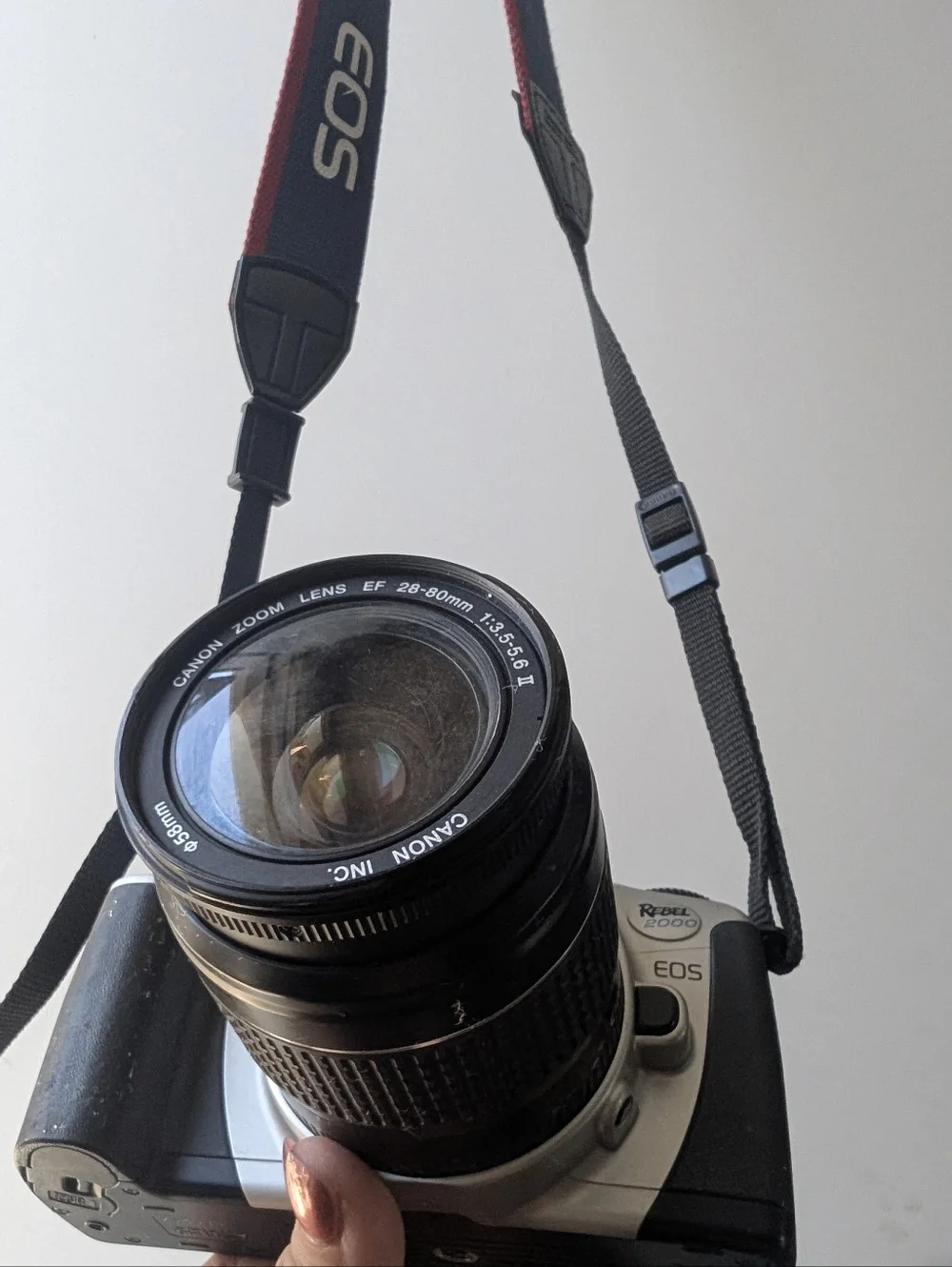 Vintage Canon Silver and Black Camera with Zoom Lens